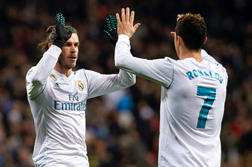 Gareth Bale and Cristiano Ronaldo greeting each other