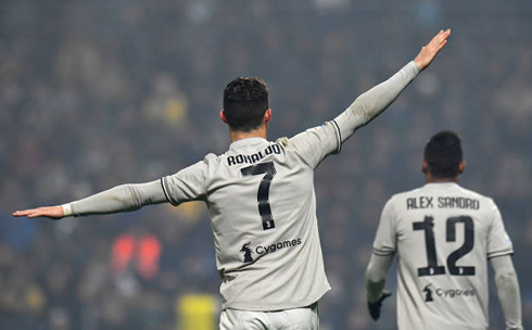 Cristiano Ronaldo makes an airplane gesture celebration after his header goal in the Serie A