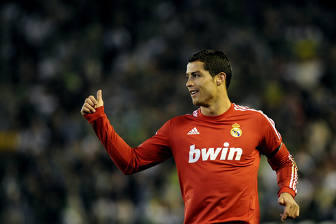 Cristiano Ronaldo showing his thumb up at a Real Madrid teammate
