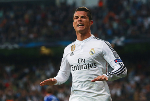 Cristiano Ronaldo calming down the fans at the Santiago Bernabéu, right after scoring for Real Madrid