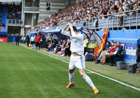 Cristiano Ronaldo landing in his trademark celebration of goals for Real Madrid