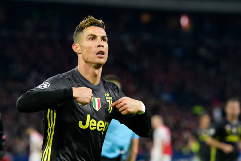 Cristiano Ronaldo points his fingers to his own chest after scoring against Ajax