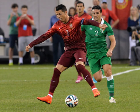 Cristiano Ronaldo protecting the ball with his body, in Portugal 5-1 Ireland, ahead of the 2014 FIFA World Cup