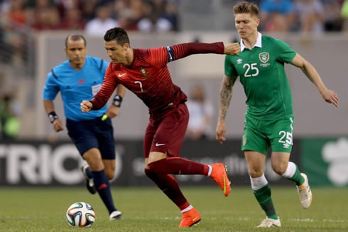 Cristiano Ronaldo running away from a defender in Portugal vs Ireland