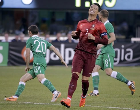 Cristiano Ronaldo smiles during a friendly match between Portugal and Ireland, a few days before the World Cup kicks off in Brazil