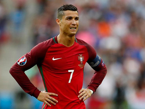 Cristiano Ronaldo with his hands around his waist, in EURO 2016 final