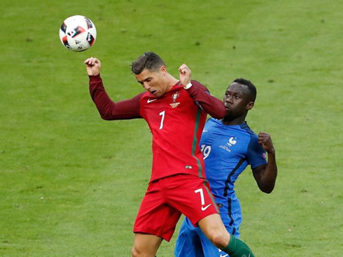 Cristiano Ronaldo heading the ball in Portugal vs France, for the EURO 2016 final