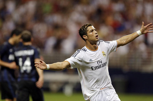 Cristiano Ronaldo running with his arms wide open, after scoring for Real Madrid against Inter Milan