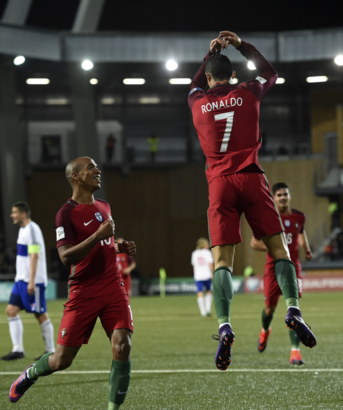 Cristiano Ronaldo jumping and landing goal celebration with Portugal