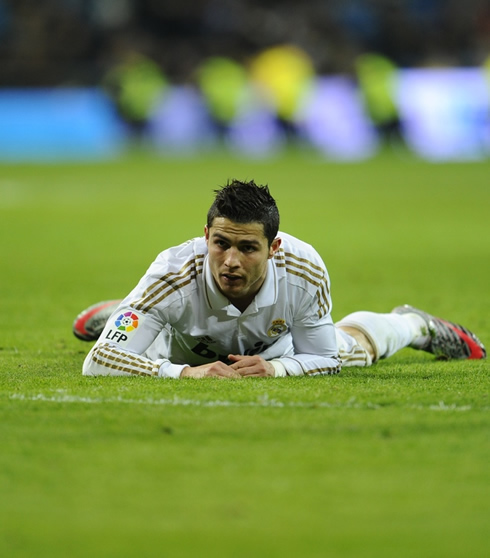 Cristiano Ronaldo layed on the ground in Real Madrid vs Barcelona