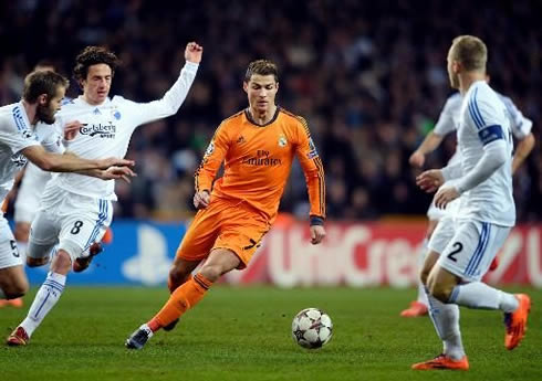 Cristiano Ronaldo slaloming between several defenders
