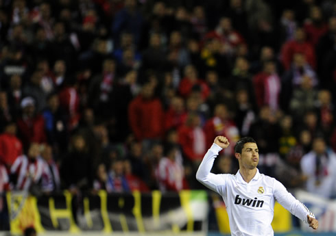 Cristiano Ronaldo celebrating Real Madrid goal with the Vicente Calderon crowd staring behind him