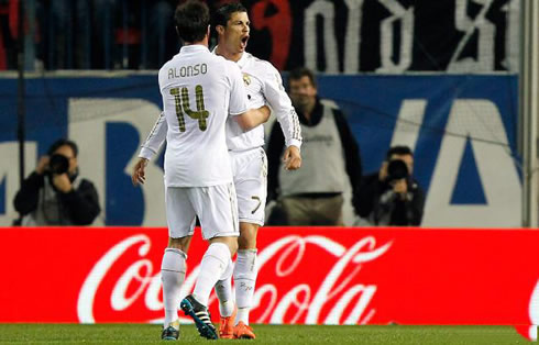 Xabi Alonso hugging and congratulating Cristiano Ronaldo for his goal against Atletico Madrid