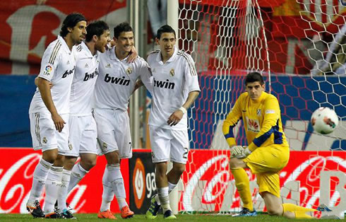 Cristiano Ronaldo with Sami Khedira, Xabi Alonso and Angel di Maria, in goal celebrations against Atletico Madrid, in 2012