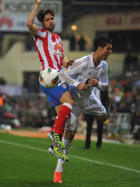 Cristiano Ronaldo playing against Diego, in Atletico Madrid vs Real Madrid in 2012