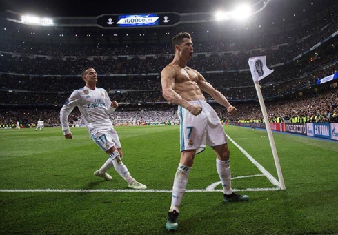 Cristiano Ronaldo without his shirt celebrating Real Madrid goal near the corner flag at the Bernabéu