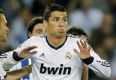 Cristiano Ronaldo acting as if he was innocent, during ag ame for Real Madrid in 2013