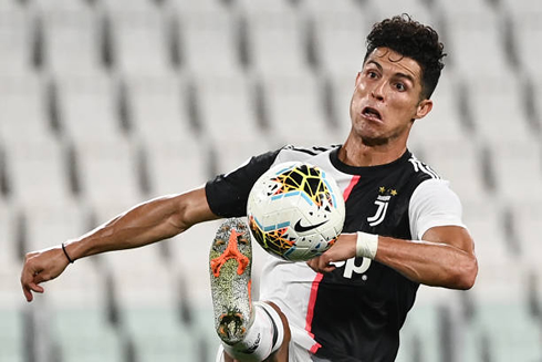 Cristiano Ronaldo funny face while trying to control a ball in a Juventus game