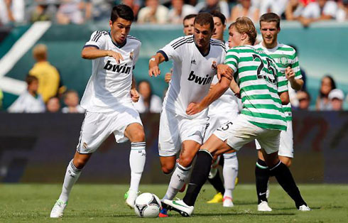 Nuri Sahin driving the ball pass a Celtic defender, in the Real Madrid pre-season tour at the United States, in 2012