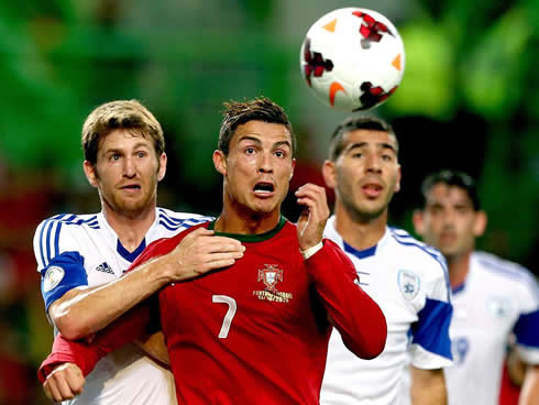 Cristiano Ronaldo being pulled by his shirt, in Portugal 1-1 Israel, for the FIFA World Cup 2014 qualifiers
