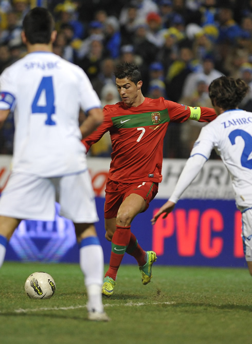 Cristiano Ronaldo taking a right-foot shot against Bosnia