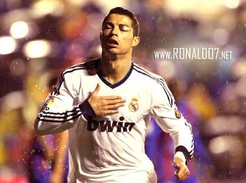 Cristiano Ronaldo celebrating Real Madrid goal against Levante with his eyes closed, showing the hero and warrior he is, as he was injured on his eye