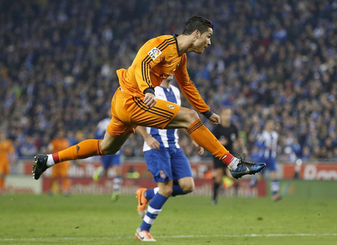 Cristiano Ronaldo completely in the air, after striking the ball