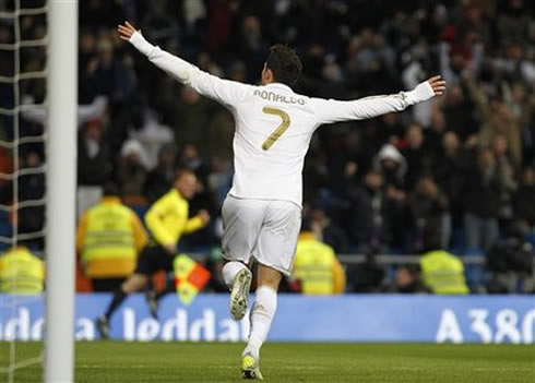 Cristiano Ronaldo running with arms wide open as he celebrates a Real Madrid goal