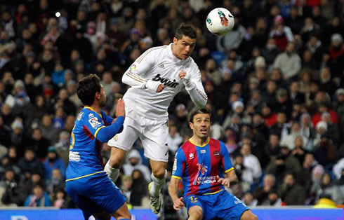 Cristiano Ronaldo about to make contact with the ball with his head, and put Real Madrid on the lead against Levante, in La Liga 2012