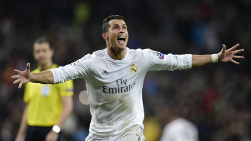 Cristiano Ronaldo opens his arms to celebrate Real Madrid 3-0 win over Wolfsburg