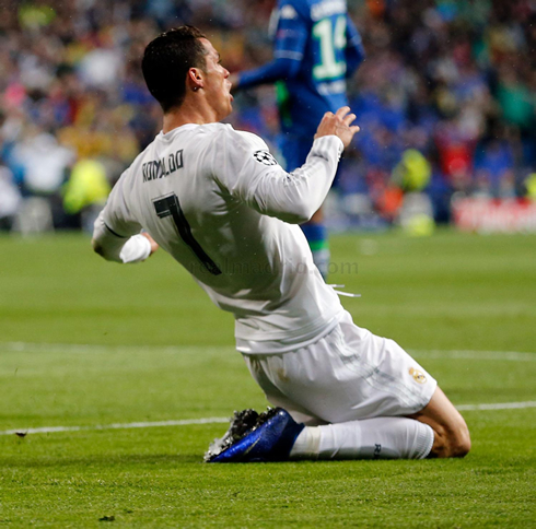 Cristiano Ronaldo sliding on his knees to celebrate Real Madrid third goal in their game against Wolfsburg for the UCL 2016
