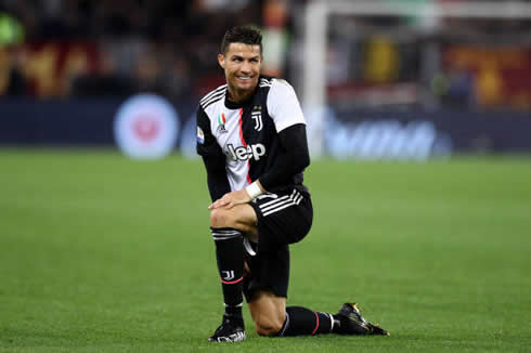 Cristiano Ronaldo down in one knee in Juventus new home jersey for 2019-2020