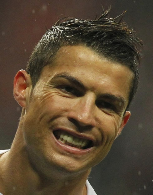 Cristiano Ronaldo smiling during the game between Russia and Portugal in Moscow, for the 2014 World Cup qualification stages