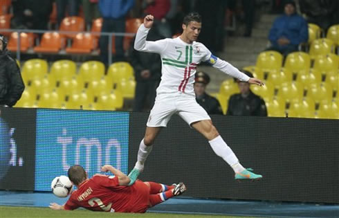Cristiano Ronaldo jumping over a defender in Russia 1-0 Portugal, for the World Cup 2014 qualification stage in 2012