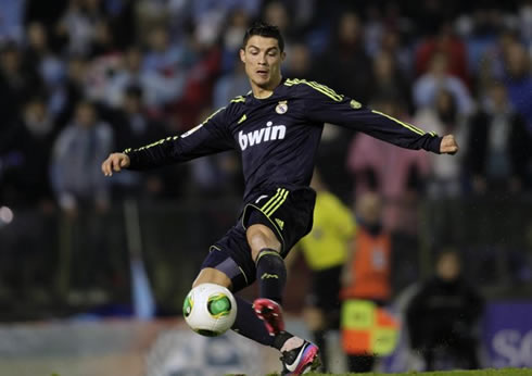 Cristiano Ronaldo left-foot control, playing in a Real Madrid dark kit, in the Copa del Rey 2012-2013