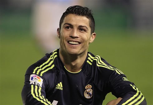 Cristiano Ronaldo showing his ironic smile and face, after a funny referee decision in Celta de Vigo vs Real Madrid, in 2012-2013
