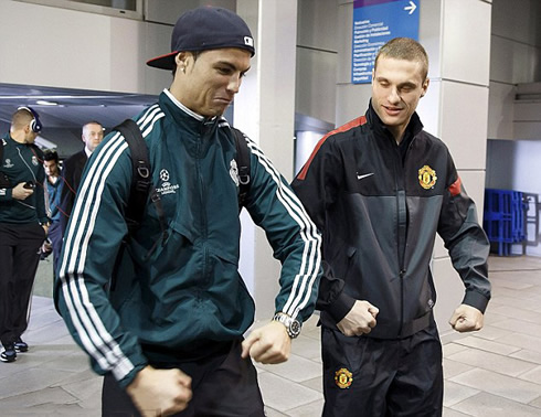 Cristiano Ronaldo being funny and joking with Nemanja Vidic, pretending to be a strong man and bodybuilder, ahead of Real Madrid vs Manchester for the Champions League first leg in 2013