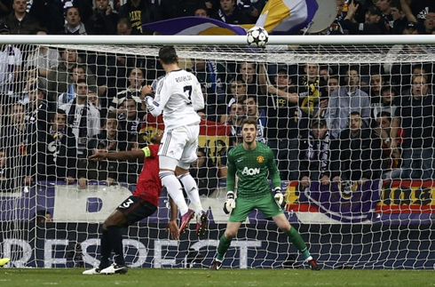 Cristiano Ronaldo jumping higher than Patrice Evra, to head the ball past De Gea and make it 1-1 in Real Madrid vs Manchester United, in the Champions League 2013