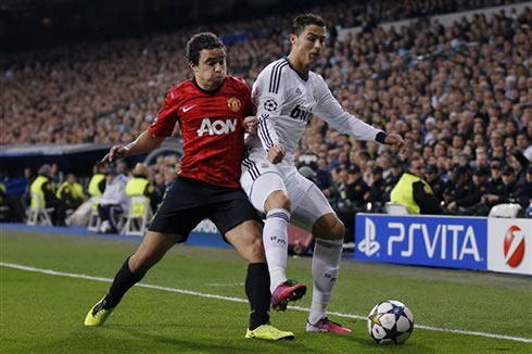 Cristiano Ronaldo being pushed on his back by Rafael da Silva, in Real Madrid 1-1 Manchester United, for the UEFA Champions League 2013
