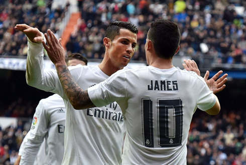 Cristiano Ronaldo hugging James Rodríguez after a Real Madrid goal