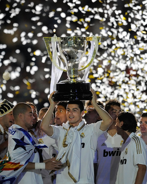 Cristiano Ronaldo holding La Liga 2012 trophy on his head, after Real Madrid last game of the season against Mallorca