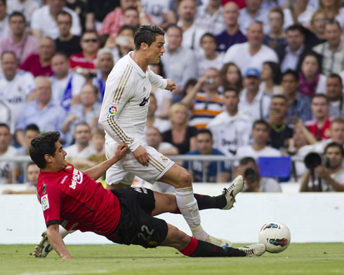 Cristiano Ronaldo being two-footed tackled from behind, in Real Madrid vs Mallorca in 2012