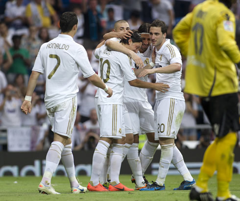 Cristiano Ronaldo preparing to join his teammates celebrations after another Real Madrid goal, in La Liga 2012