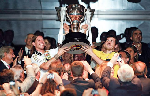 Real Madrid captain, Sergio Ramos and Iker Casillas, lifting La Liga trophy/title in the air, at the Santiago Bernabéu in 2012