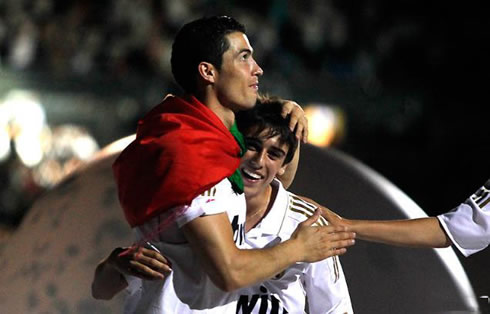Cristiano Ronaldo and a young Real Madrid football player from the cantera/youth system