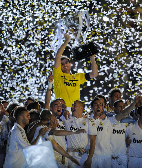 Real Madrid captain and goalkeeper, Iker Casillas, lifting La Liga trophy after the last game of the season, at the Santiago Bernabéu in 2012