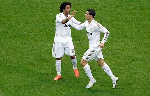Marcelo congratulating Cristiano Ronaldo for having scored a goal for Real Madrid against Mallorca, in 2012