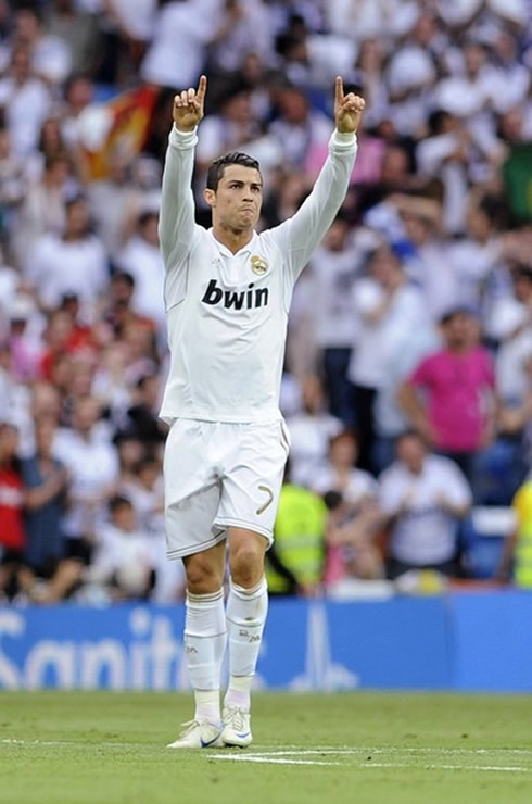 Cristiano Ronaldo puts his two fingers up, to dedicate the goal he just scored to his girlfriend Irina Shayk, as well as his son, Cristiano Ronaldo Jr.