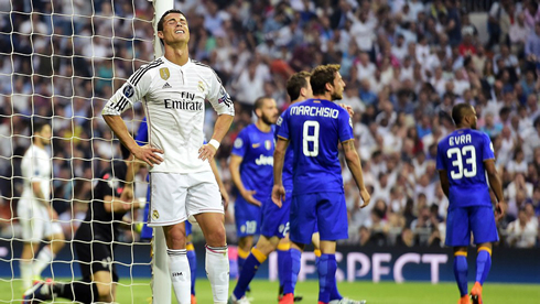 Cristiano Ronaldo reacts after Real Madrid wastes a good chance against Juventus