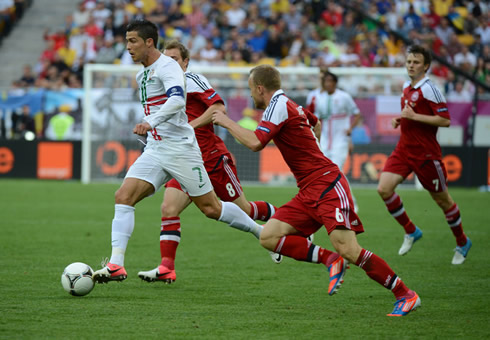Cristiano Ronaldo cutting inside and leaving several Denmark defenders behind him, in the EURO 2012